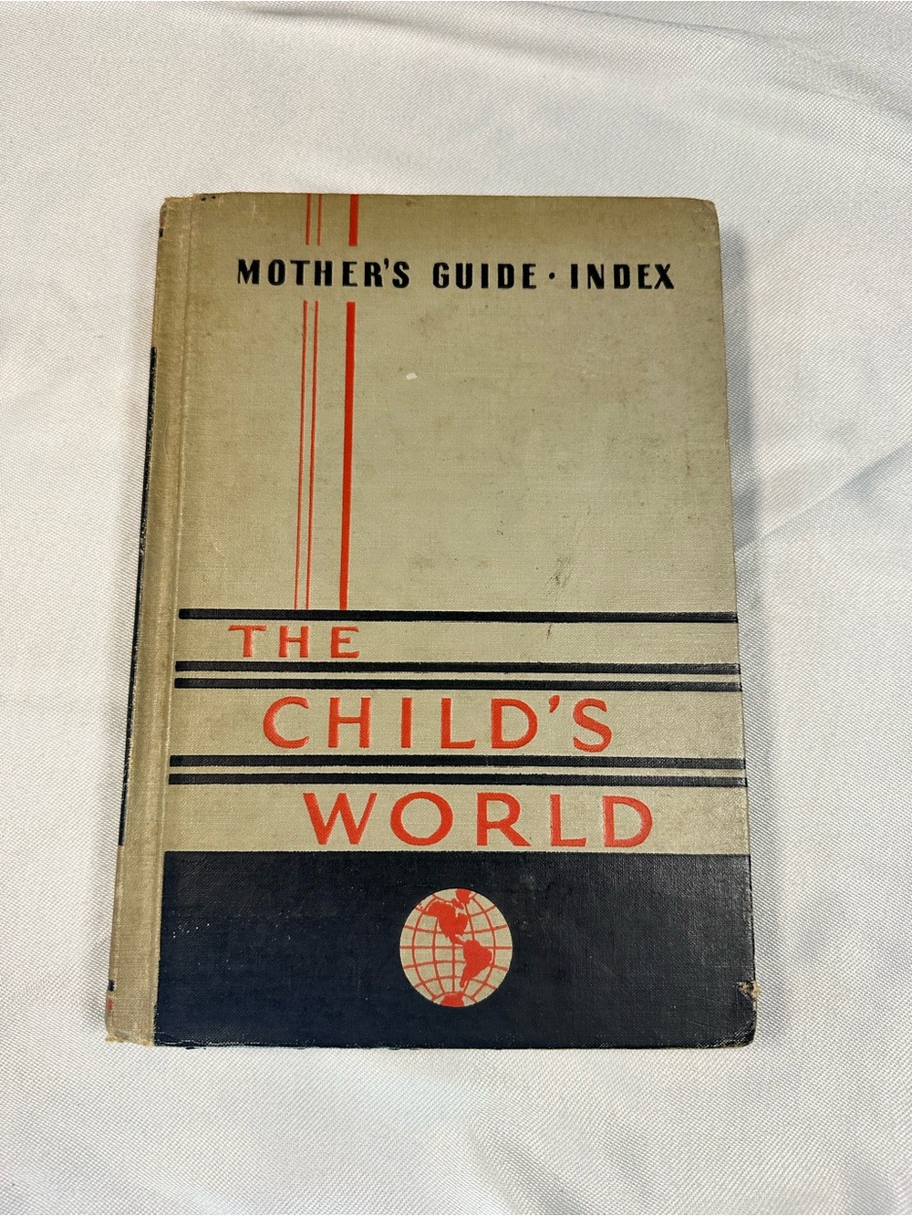 The Child's World Vintage Guidebook in Beige, Black & Red